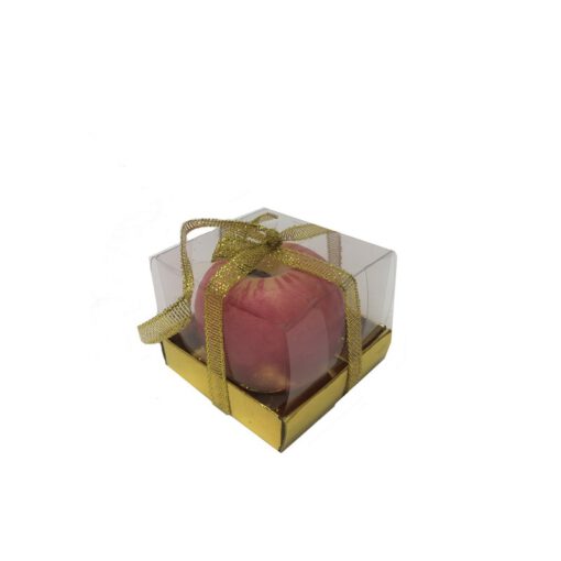 נר בצורת תפוח-אדום של חברת דקל